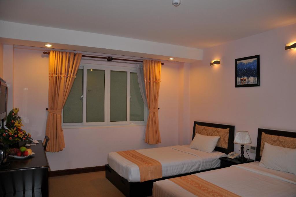 Dong Kinh A Hotel Cidade de Ho Chi Minh Quarto foto